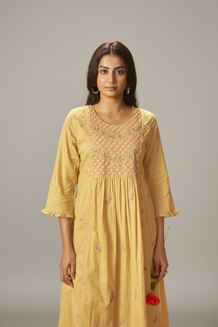 Pastel Yellow A-Line Cotton Embroidery Kurta Set
