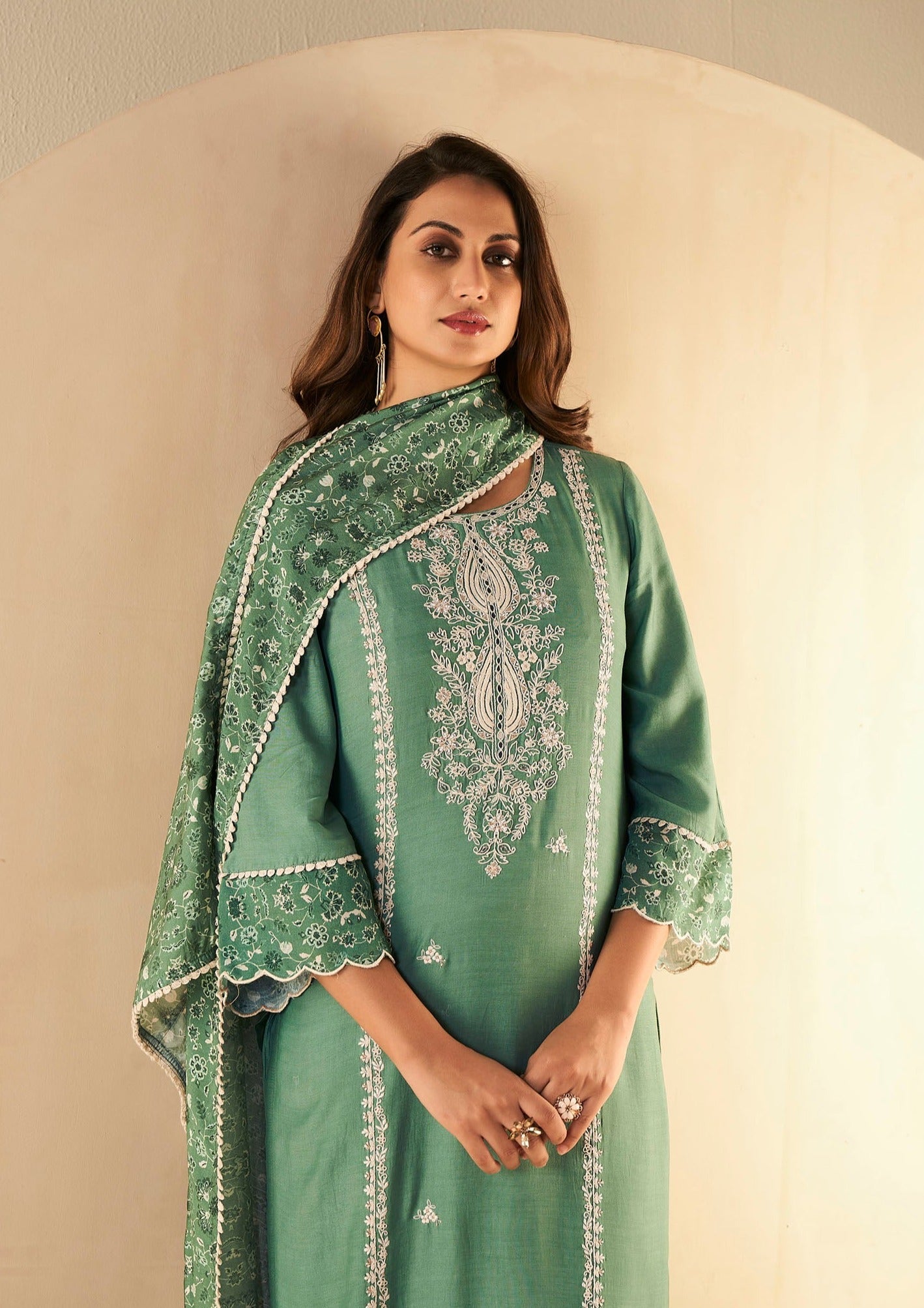 Emerald Elegance Muslin Embroidery Kurta Set-fourbuttons-in