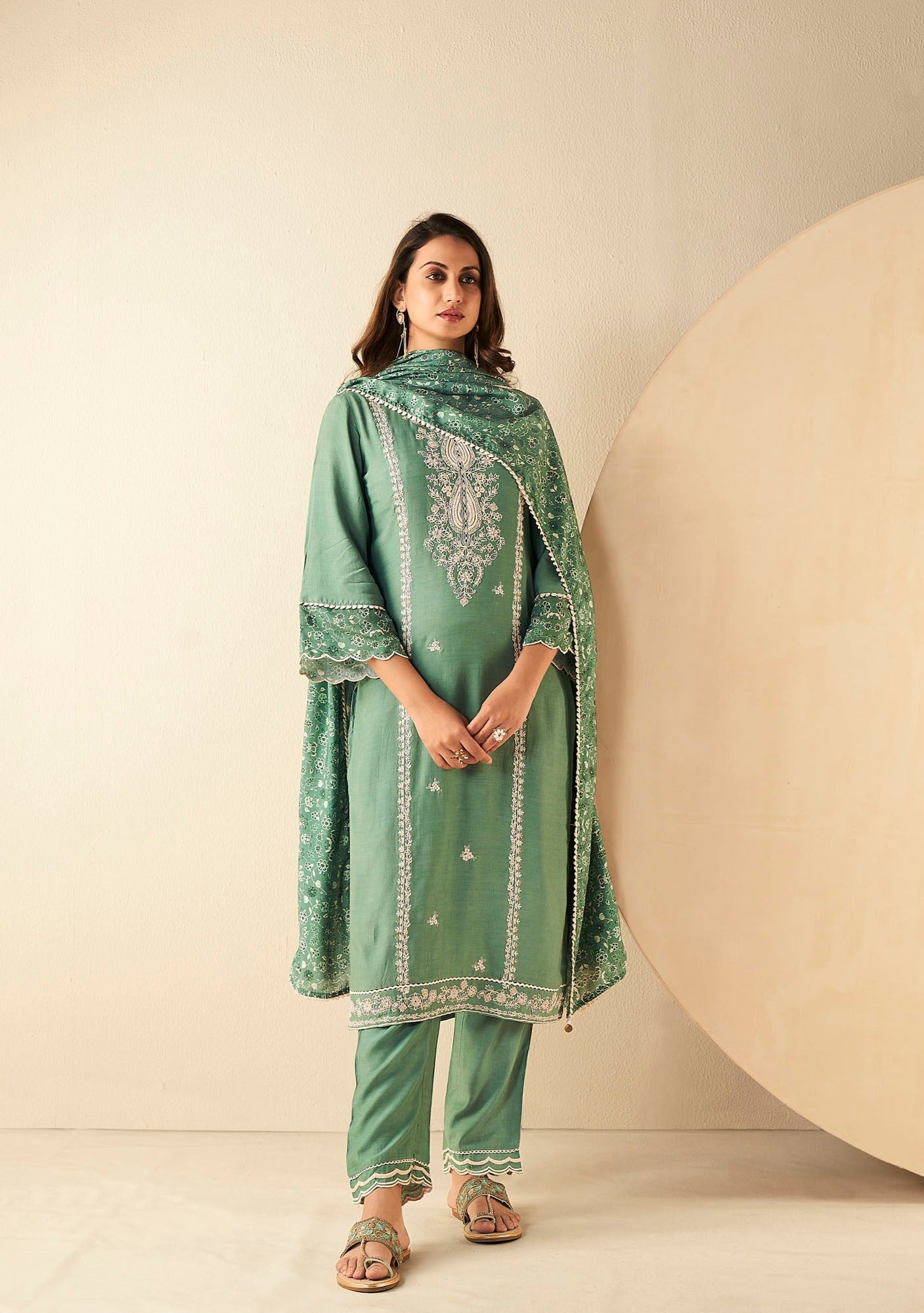 Emerald Elegance Muslin Embroidery Kurta Set-fourbuttons-in