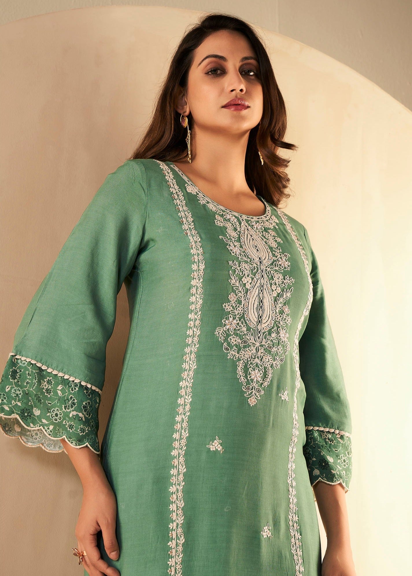 Emerald Elegance Muslin Embroidery Kurta Set-fourbuttons-in