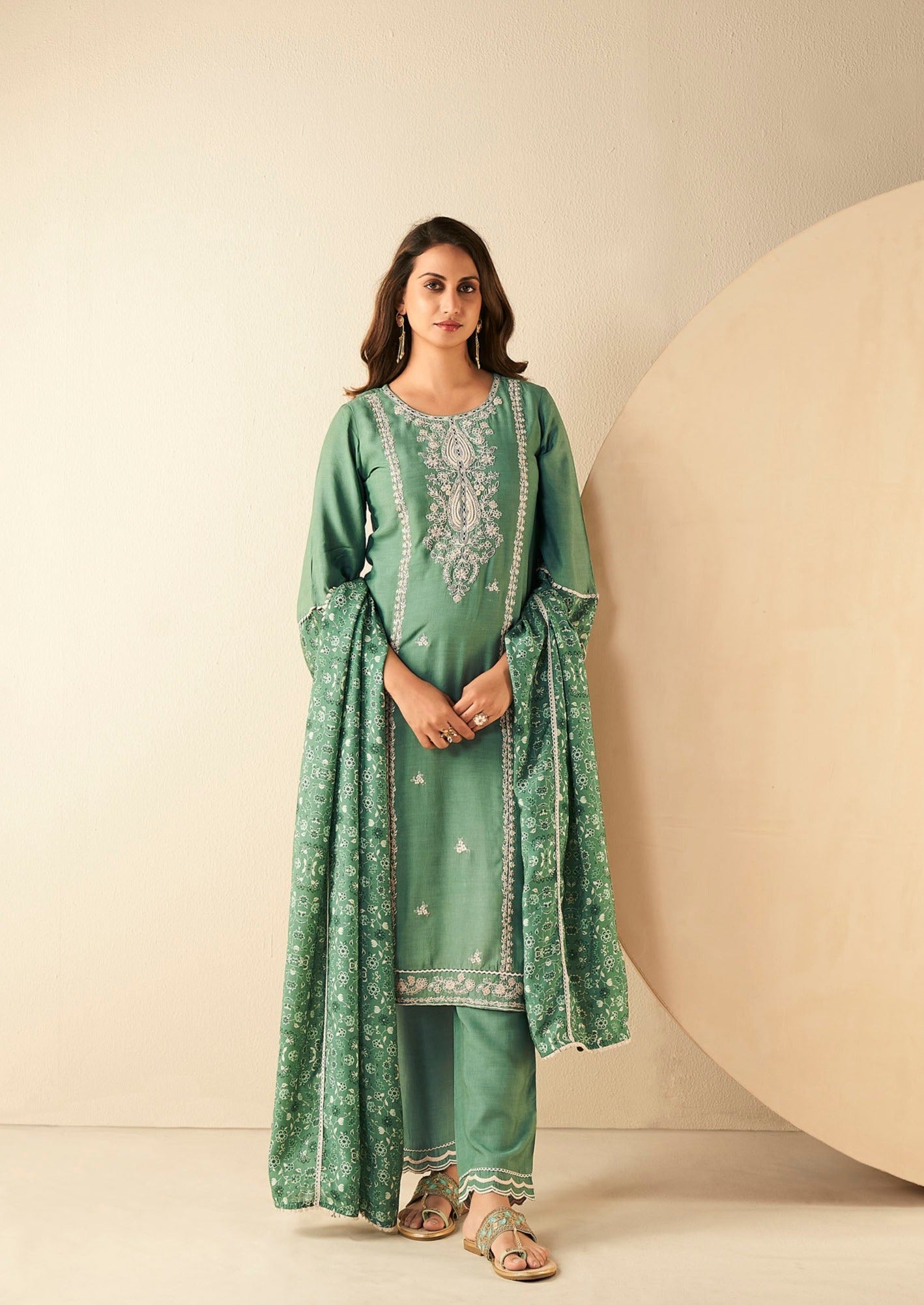 Emerald Elegance Muslin Embroidery Kurta Set-fourbuttons-in