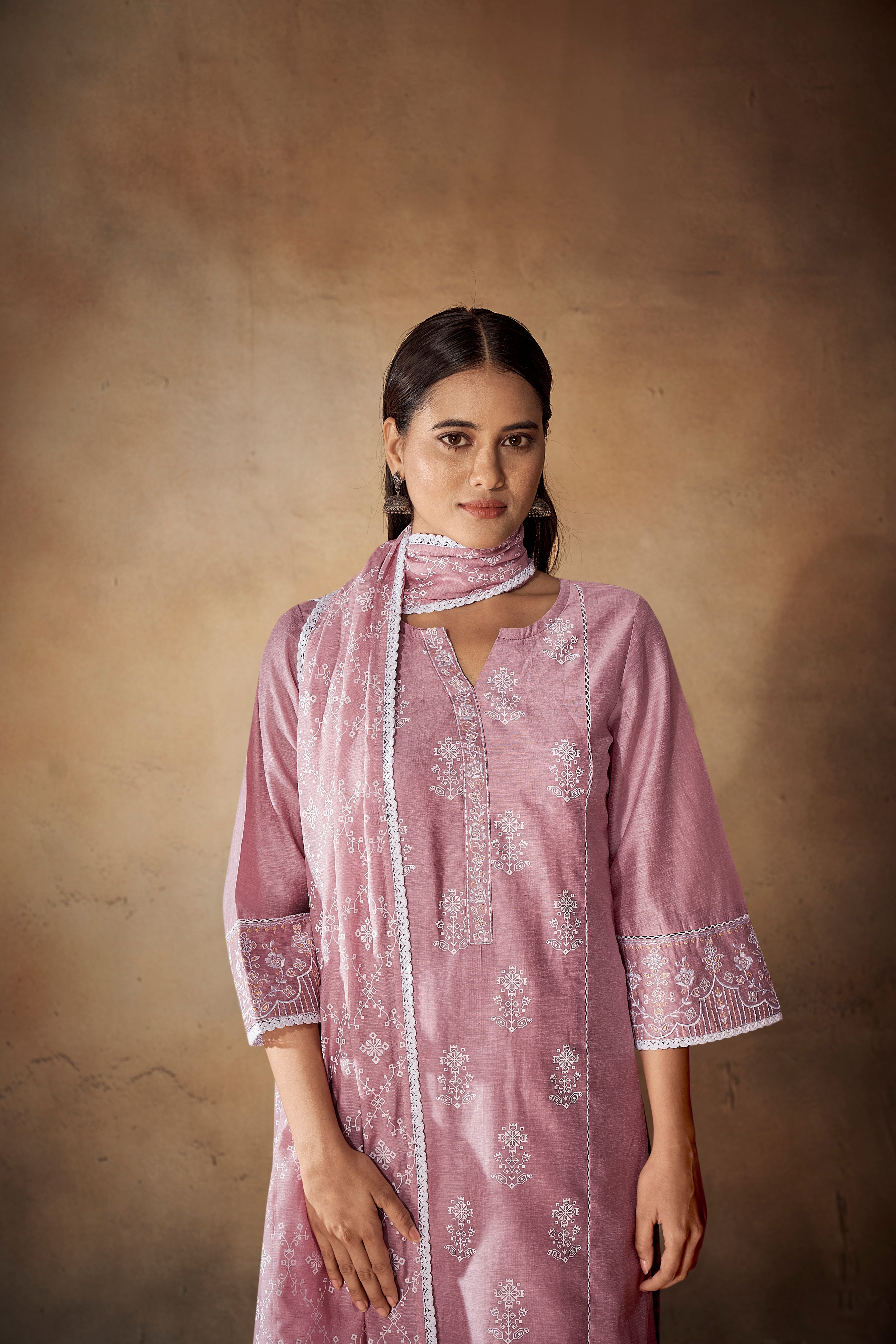 Purple Tawny Lavish Embroidery Kurta Set-fourbuttons-in